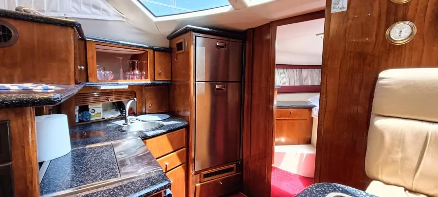 The galley, with its wood cabinetry and worktop