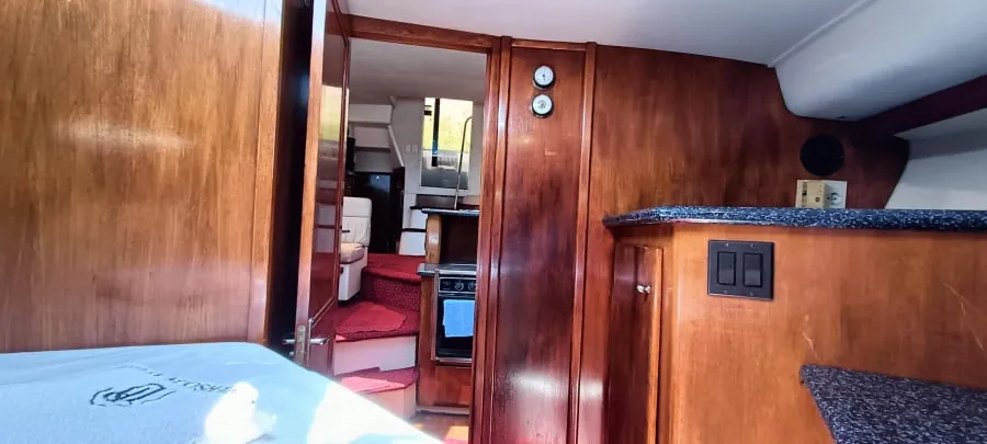 The wood-panelled companionway between the cabins